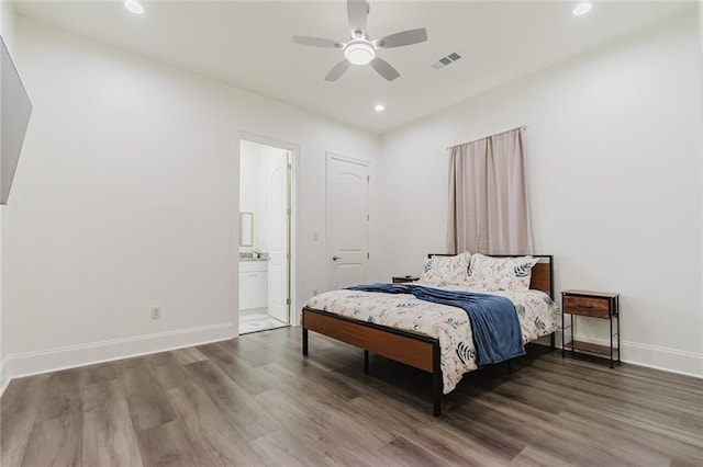 8532 Regiment Dr, Chalmette, LA 70043 - bedroom featuring wood finished floors, recessed lighting, ensuite bathroom, and ceiling fan
