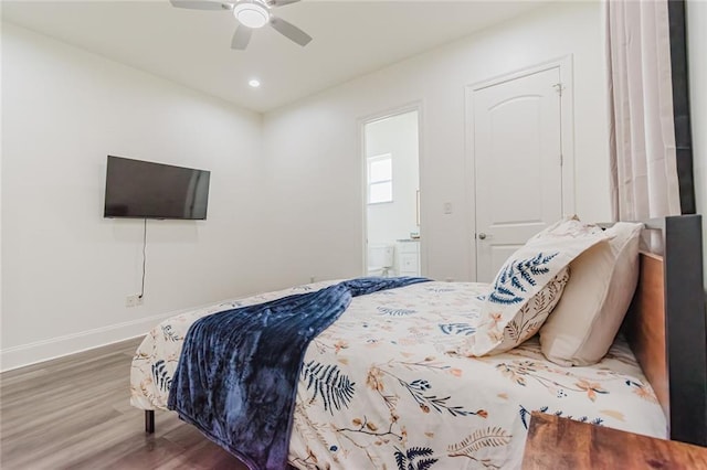 8532 Regiment Dr, Chalmette, LA 70043 - bedroom featuring wood finished floors, ensuite bathroom, a ceiling fan, and recessed lighting