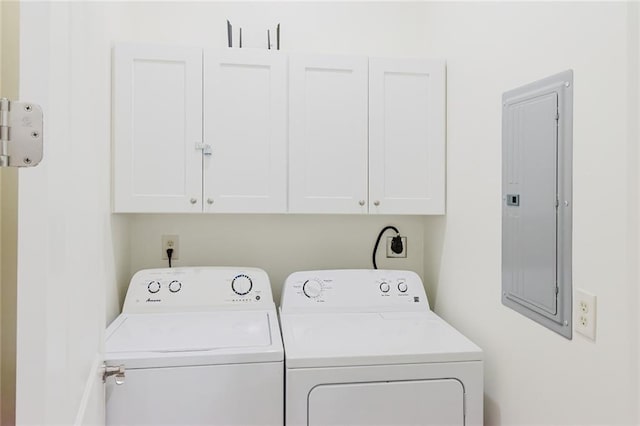 8532 Regiment Dr, Chalmette, LA 70043 - laundry room with electric panel, washer and dryer, and cabinet space