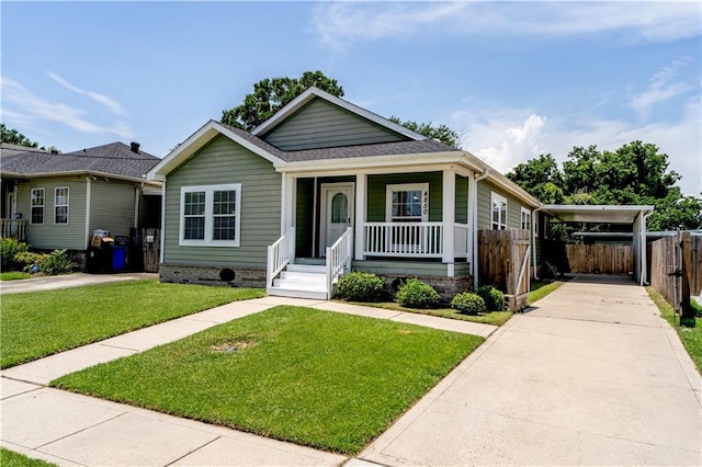 4850 Pauline Dr, New Orleans, LA 70126 - view of front of property with covered porch, driveway, and roof with shingles
