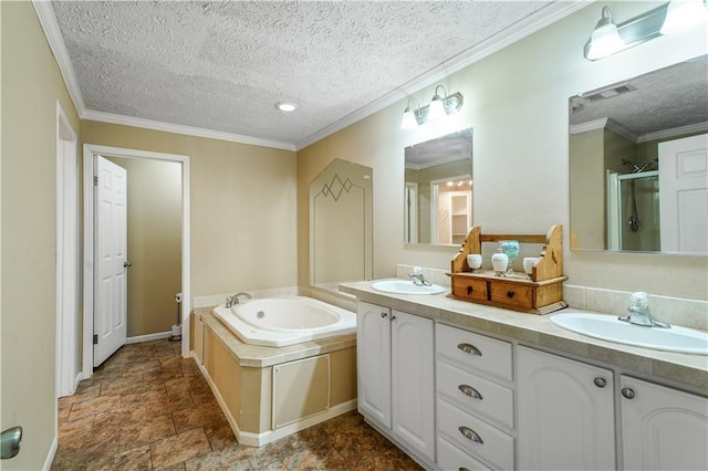 4850 Pauline Dr, New Orleans, LA 70126 - full bathroom featuring double vanity, a textured ceiling, a garden tub, a stall shower, and stone finish flooring