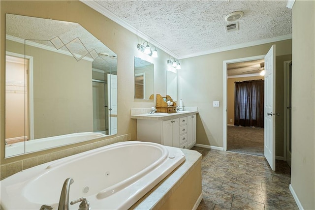 4850 Pauline Dr, New Orleans, LA 70126 - bathroom featuring a whirlpool tub, vanity, crown molding, stone finish flooring, and a textured ceiling