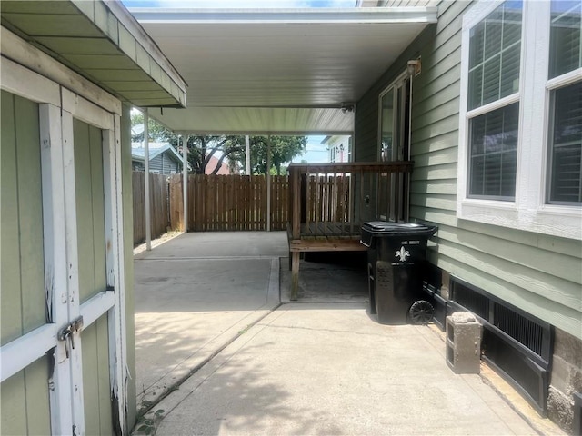 4850 Pauline Dr, New Orleans, LA 70126 - view of patio with a carport