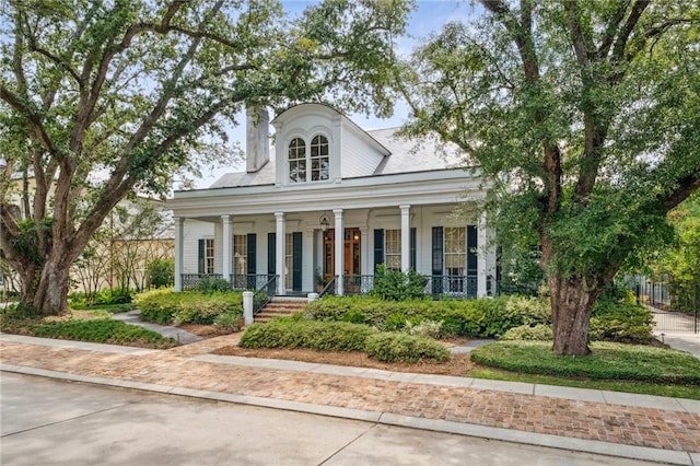 52 Tokalon Pl, Metairie, LA 70001 - neoclassical / greek revival house with a porch