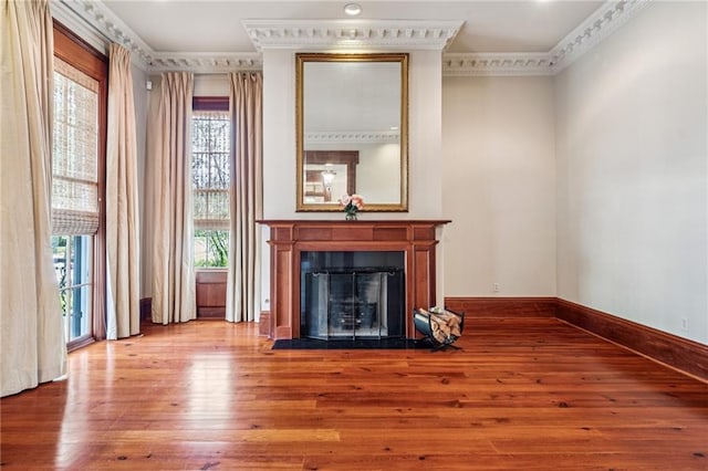 52 Tokalon Pl, Metairie, LA 70001 - living area with ornamental molding, wood-type flooring, and a fireplace with flush hearth