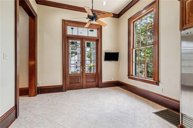 52 Tokalon Pl, Metairie, LA 70001 - foyer entrance featuring crown molding, light tile patterned flooring, ceiling fan, and french doors