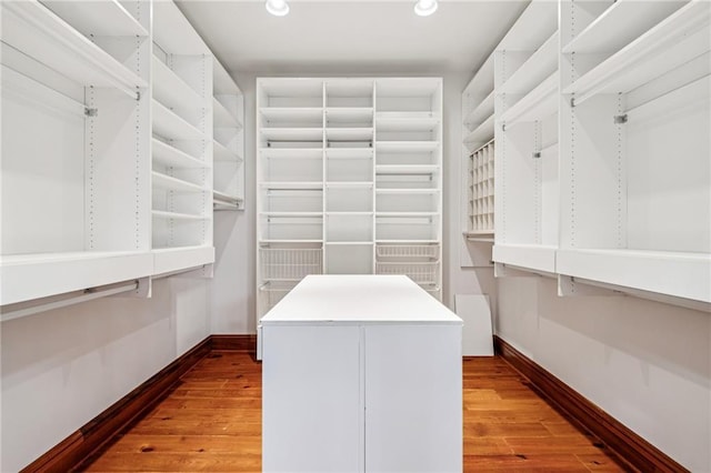52 Tokalon Pl, Metairie, LA 70001 - walk in closet with wood finished floors