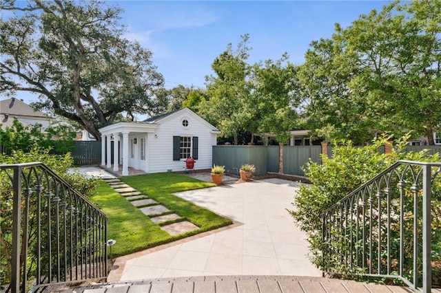 52 Tokalon Pl, Metairie, LA 70001 - view of front of property featuring stairway and a patio area