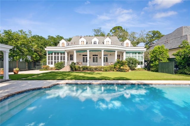 52 Tokalon Pl, Metairie, LA 70001 - back of house featuring an outdoor pool