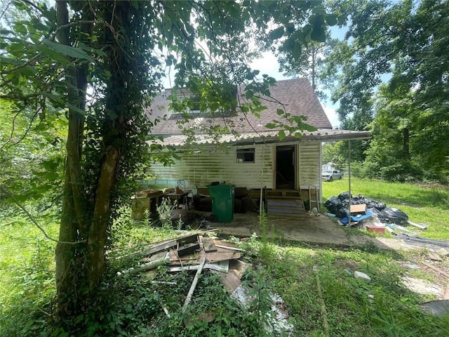 24180 Joe May Rd, Denham Springs, LA 70726 - rear view of property featuring entry steps and a shingled roof