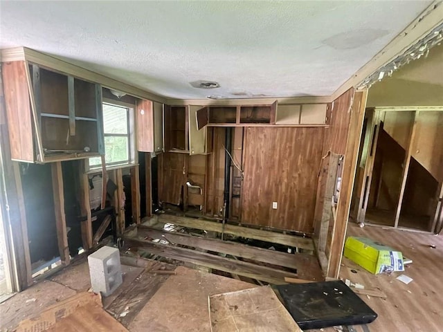 24180 Joe May Rd, Denham Springs, LA 70726 - misc room featuring a textured ceiling