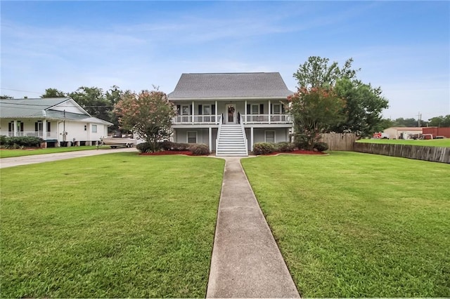 4969 Tasha Ln, Jean Lafitte, LA 70067 - view of front of property featuring stairway and covered porch