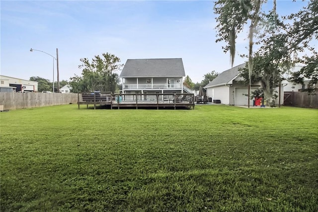 4969 Tasha Ln, Jean Lafitte, LA 70067 - rear view of property with a deck and a detached garage