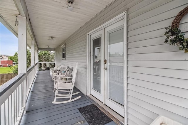 4969 Tasha Ln, Jean Lafitte, LA 70067 - wooden porch with a ceiling fan