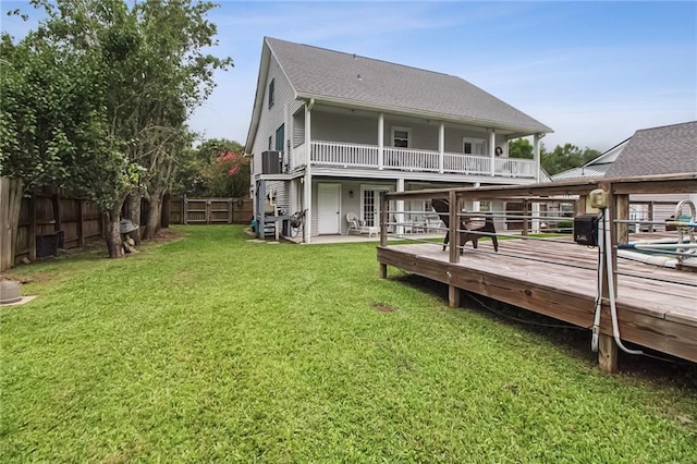 4969 Tasha Ln, Jean Lafitte, LA 70067 - rear view of house with a fenced backyard and a deck