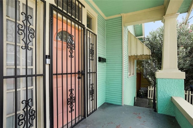1717 Painters St, New Orleans, LA 70117 - view of exterior entry with a porch