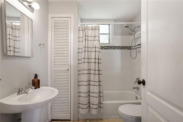 1717 Painters St, New Orleans, LA 70117 - full bathroom with a closet and shower / bath combination with curtain