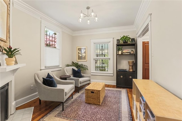 1824 Ursulines Ave, New Orleans, LA 70116 - living area with light wood-style flooring, plenty of natural light, crown molding, a chandelier, and a fireplace with flush hearth