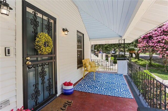 1824 Ursulines Ave, New Orleans, LA 70116 - property entrance with a porch