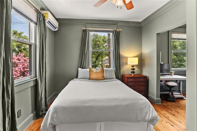1824 Ursulines Ave, New Orleans, LA 70116 - bedroom with a wall mounted air conditioner, ornamental molding, wood finished floors, and a ceiling fan