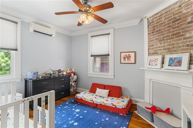 1824 Ursulines Ave, New Orleans, LA 70116 - bedroom with a wall mounted AC, wood finished floors, ornamental molding, and ceiling fan