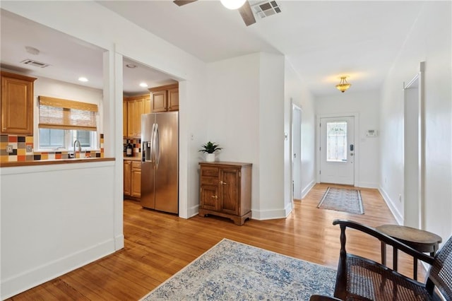 1419 Pine St, New Orleans, LA 70118 - foyer entrance with light wood-type flooring, ceiling fan, and recessed lighting