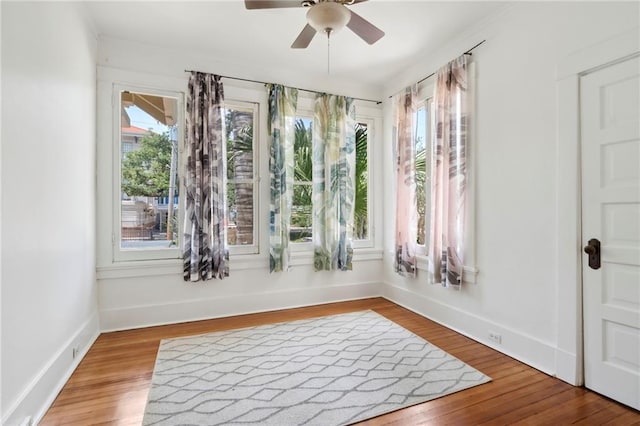 1419 Pine St, New Orleans, LA 70118 - unfurnished room featuring a ceiling fan and wood finished floors