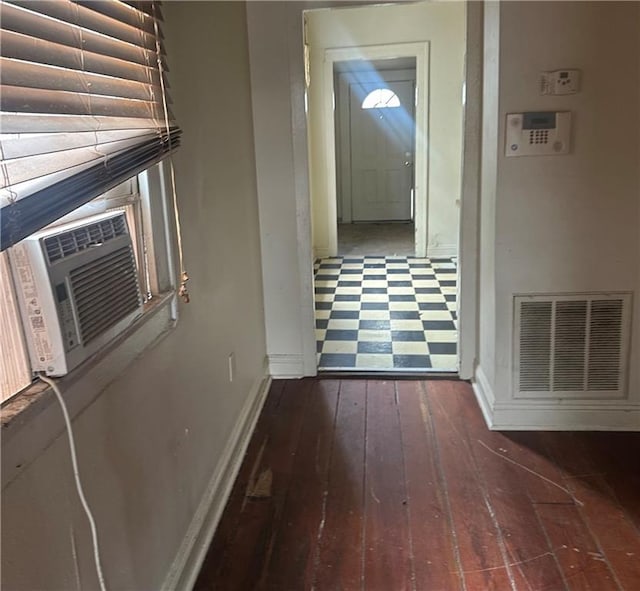 5827 Tchoupitoulas St, New Orleans, LA 70115 - hallway featuring baseboards and hardwood / wood-style floors