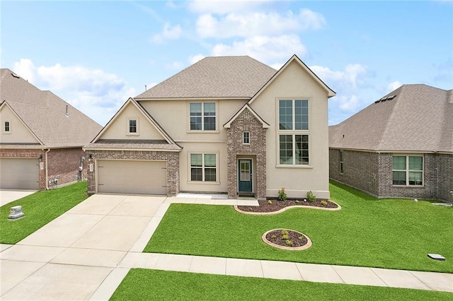 6031 Belfast Bend Ct, Slidell, LA 70461 - traditional-style house with stucco siding, driveway, a front lawn, an attached garage, and brick siding