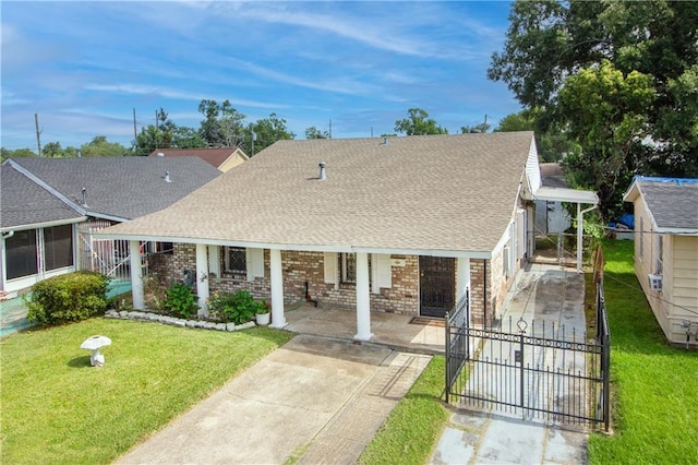 8013 Simon St, Metairie, LA 70003 - view of front of property with a gate, brick siding, and roof with shingles