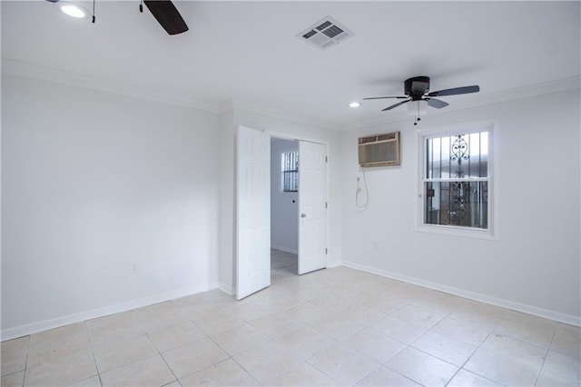 8013 Simon St, Metairie, LA 70003 - spare room featuring a ceiling fan, an AC wall unit, crown molding, recessed lighting, and light tile patterned floors