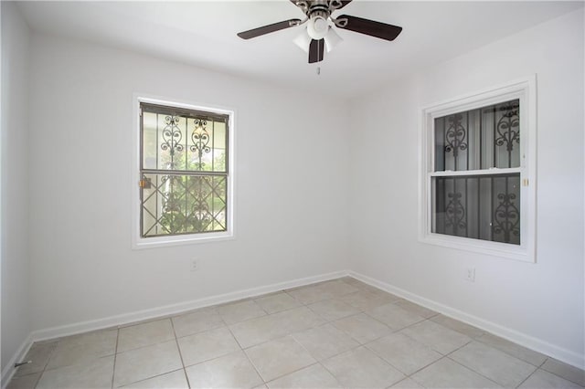 8013 Simon St, Metairie, LA 70003 - spare room featuring a ceiling fan and light tile patterned floors