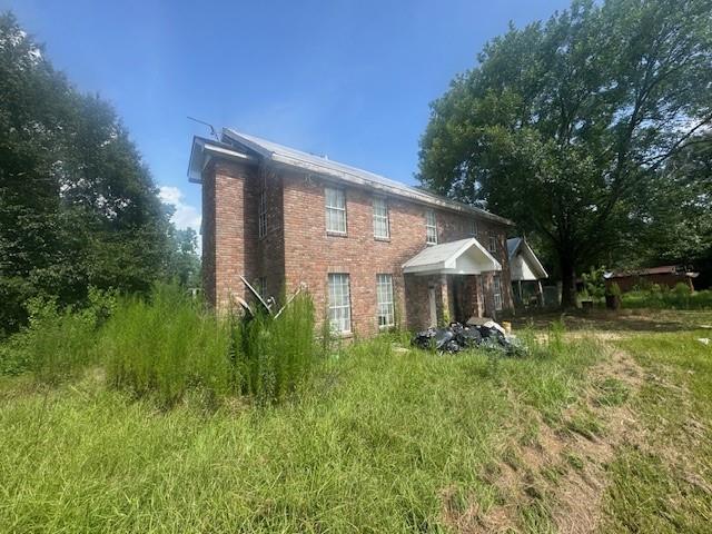 85274 Kings Rd, Bogalusa, LA 70427 - back of property featuring brick siding
