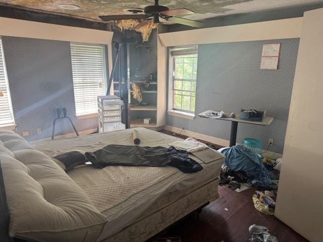 85274 Kings Rd, Bogalusa, LA 70427 - bedroom with wood finished floors and ceiling fan