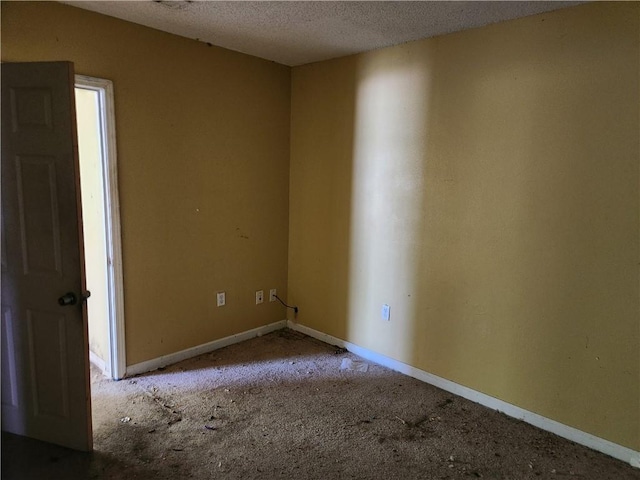 4440 Werner Dr, New Orleans, LA 70126 - empty room featuring carpet and a textured ceiling