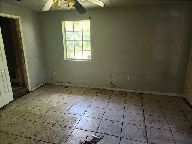 4440 Werner Dr, New Orleans, LA 70126 - tiled spare room featuring ceiling fan