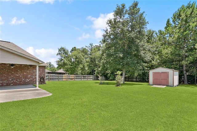 324 Nelson Landing Dr, Pearl River, LA 70452 - fenced backyard featuring a storage unit and a patio area