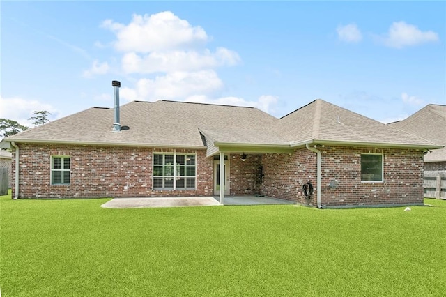 324 Nelson Landing Dr, Pearl River, LA 70452 - rear view of house with roof with shingles, brick siding, and a patio area