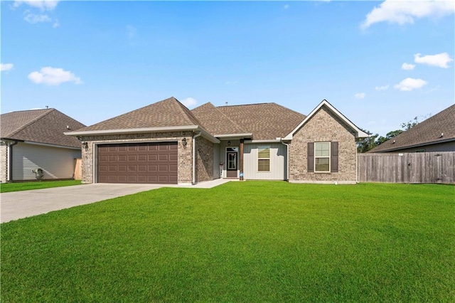 42333 Jasper Ln, Ponchatoula, LA 70454 - ranch-style home featuring a garage, concrete driveway, brick siding, and a shingled roof