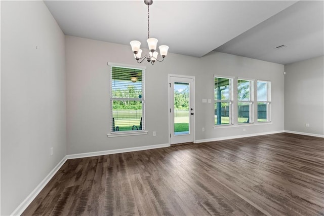 42333 Jasper Ln, Ponchatoula, LA 70454 - spare room featuring a chandelier and dark wood finished floors