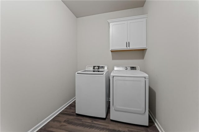 42333 Jasper Ln, Ponchatoula, LA 70454 - laundry area featuring cabinet space, washing machine and clothes dryer, and dark wood-type flooring