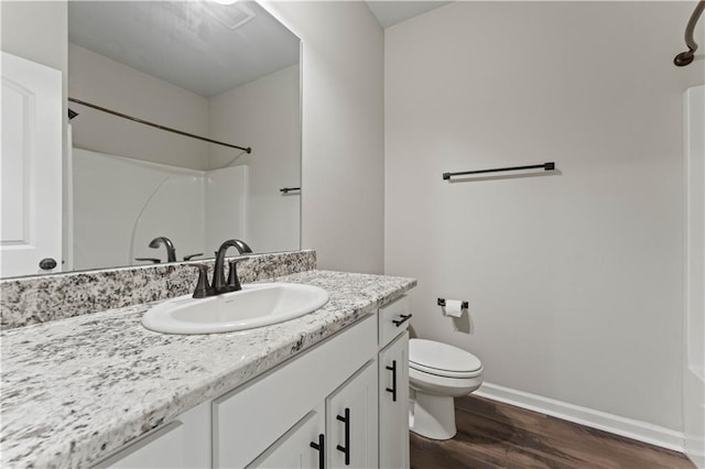 42333 Jasper Ln, Ponchatoula, LA 70454 - full bath featuring wood finished floors, a shower, and vanity