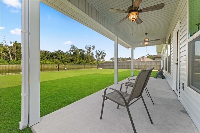 42333 Jasper Ln, Ponchatoula, LA 70454 - fenced backyard with a patio area and ceiling fan
