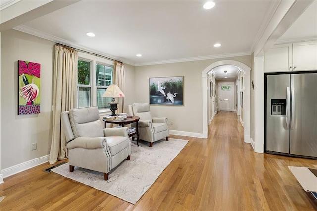 42 Crane St, New Orleans, LA 70124 - living area featuring arched walkways, light wood-type flooring, ornamental molding, and recessed lighting