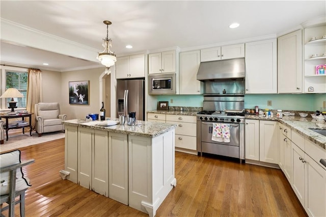42 Crane St, New Orleans, LA 70124 - kitchen featuring stainless steel appliances, under cabinet range hood, open shelves, light wood-type flooring, and ornamental molding
