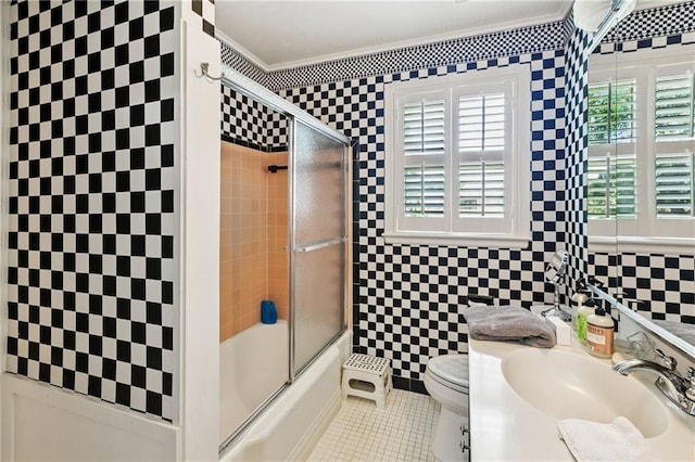 42 Crane St, New Orleans, LA 70124 - full bathroom featuring ornamental molding, enclosed tub / shower combo, vanity, tile walls, and tile patterned floors