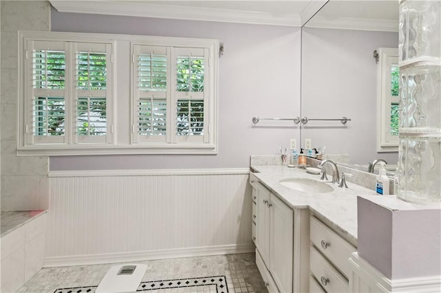 42 Crane St, New Orleans, LA 70124 - bathroom featuring vanity, crown molding, healthy amount of natural light, and wainscoting