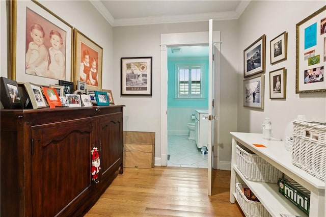 42 Crane St, New Orleans, LA 70124 - bedroom featuring light wood finished floors, crown molding, and ensuite bathroom