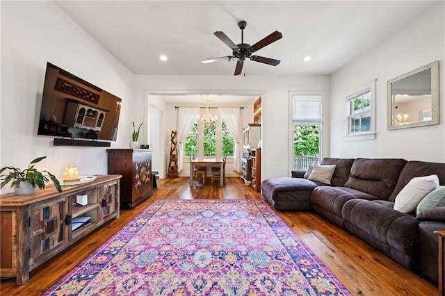 110 Atlantic Ave, New Orleans, LA 70114 - living room featuring a chandelier, a ceiling fan, wood-type flooring, and recessed lighting