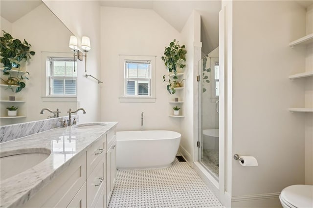 110 Atlantic Ave, New Orleans, LA 70114 - full bath with double vanity, a shower stall, a soaking tub, plenty of natural light, and lofted ceiling